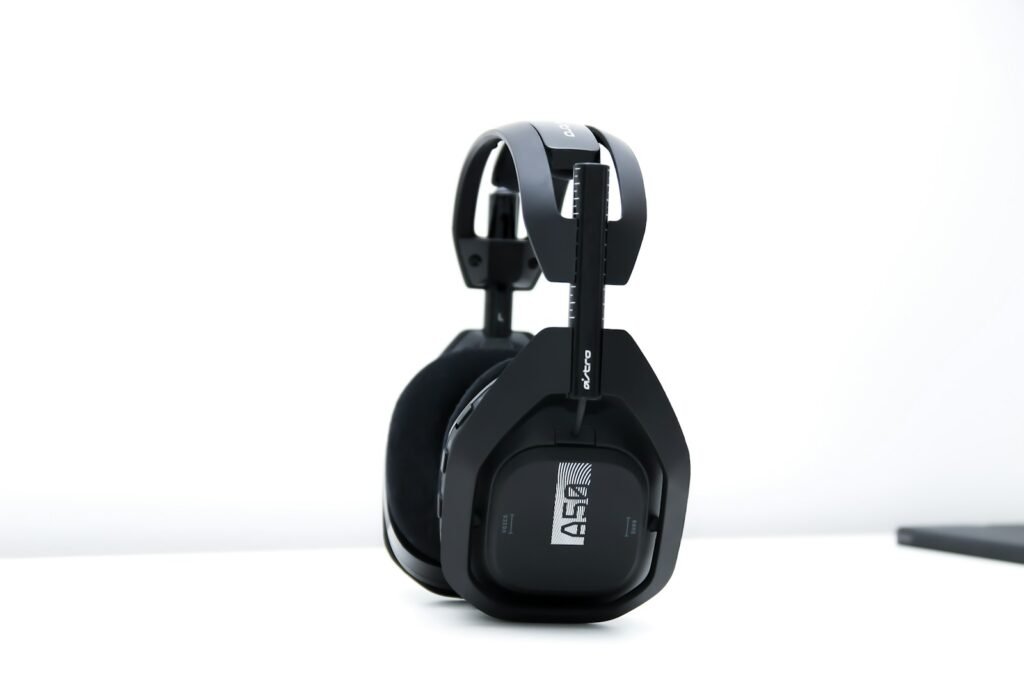black and gray corded headphones